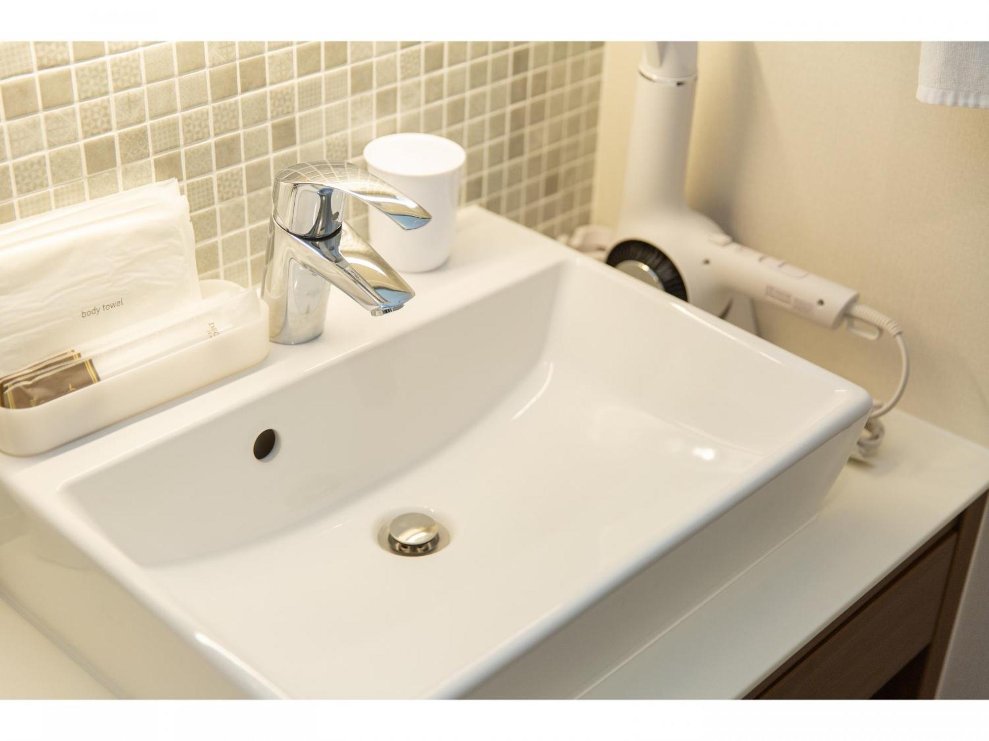 Grand Base Hiroshima Ekimae Aparthotel Exterior photo